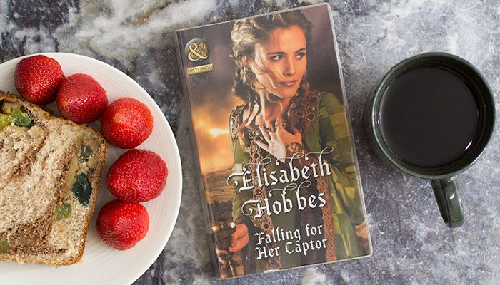 Falling for Her Captor by Elisabeth Hobbes