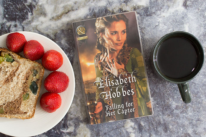 Falling for Her Captor by Elisabeth Hobbes