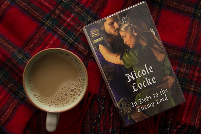 In Debt to the Enemy Lord by Nicole Locke